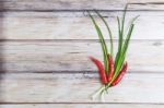 Red Hot Chilli Pepper And Green Onion Stock Photo