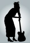 Silhouette female guitarist Stock Photo