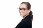 Side Profile Of A Woman Wearing Spectacles Stock Photo