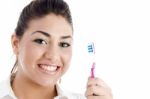 Smiling Woman With Toothbrush Stock Photo