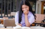 Asia Thai High School Student Uniform Beautiful Girl Read A Book Stock Photo