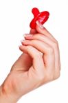 Hand Holding A Condom Stock Photo