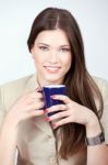 Woman Holding Blue Cup Of Coffee Stock Photo