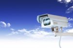 Security Camera Or CCTV On Blue Sky Stock Photo