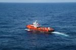 Supply Boat Transfer Cargo To Oil And Gas Industry Stock Photo