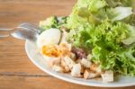 Homemade Salad Serving On Wooden Table Stock Photo