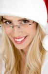 Young Woman Wearing Santa Hat Stock Photo