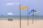 Beach Chairs And White Umbrella Stock Photo