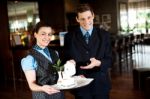 Waitress Holding Tea Tray Stock Photo