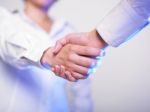 Businesswoman Handshaking Stock Photo