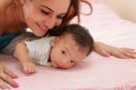 Hispanic Mother And Her Newborn Baby Stock Photo