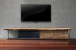 Led Tv On Concrete Wall With Wooden Furniture In Living Room Stock Photo