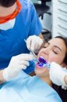 Cute Young Woman At The Dentist. Mouth Checkup Stock Photo