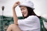 Thai Adult Girl White T-shirt Beautiful Girl Relax And Smile Stock Photo