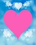 Pink Heart On Blue Blurry Background Stock Photo