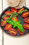 Baked Cherry Tomatoes With Basil And Thyme Stock Photo