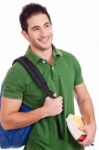 Student Carrying Bag And Books Stock Photo