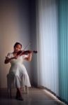 Girl Playing Violin Stock Photo