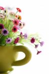 Colorful Is Flowers In A Green Vase Stock Photo