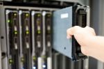 Man Fix Server Network In Data Center Room Stock Photo