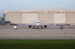 Passenger Jet Plane Parking On Taxi Way Stock Photo