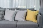 Yellow Pillow On Grey Sofa In Modern Living Room Stock Photo