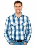 Smiling Young Man Standing On White Stock Photo