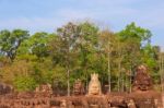 Statues Of Ancient Khmer Warrior Heads Carry Giant Snake Decorat Stock Photo