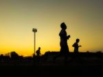 Silhouette Teen Age Run Together  Track Stock Photo