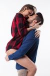 Happy Young Loving Couple In Studio Stock Photo