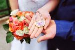 Newlyweds Hold The Lock Stock Photo