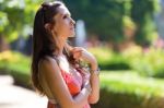 Beautiful Woman With Dark Hair And Brown Eyes Posing At Summer G Stock Photo