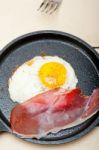 Egg Sunny Side Up With Italian Speck Ham Stock Photo