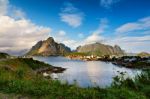 Norway Village On A Fjord. Nordic Cloudy Summer Day Stock Photo