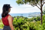 Woman Tourist On High Scenic View Stock Photo