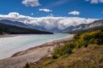 Storm Clouds Gathering Over Lake Sherburne Stock Photo