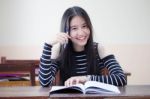 Portrait Of Thai Teen Beautiful Girl Writing Book Stock Photo