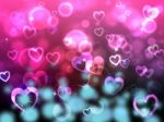 Glow Bokeh Shows Heart Shapes And Backdrop Stock Photo