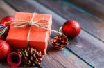 Gift On A Wooden Table Stock Photo