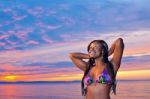 Beautiful Black African American Woman Posing On The Beach At Su Stock Photo