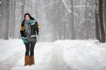 Beautiful Young Woman In A Sweater On A Winter Walk In A Park Stock Photo