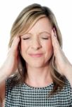 Woman Having A Bad Headache Stock Photo