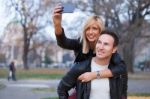 Young Couple In Park Stock Photo