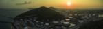 Aerial View Of Oil Refinery Tank Storage In Heavy Petrochemical Industries Estate Against Sun Rising Sky Stock Photo