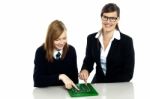 Teacher And Student Working On Calculator Stock Photo