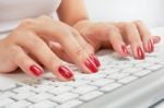 Typing On Keyboard Stock Photo