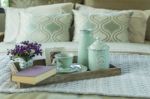 Decorative Tray With Book,tea Set And Flower On The Bed Stock Photo