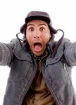 Surprised Man Posing In Front Of Camera Stock Photo