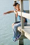 Portrait Of Young Couple Looking At The Horizon Stock Photo