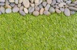 Stone On Grass Background Stock Photo